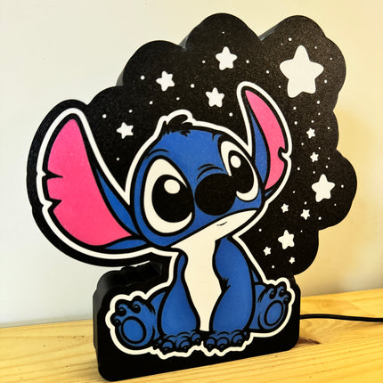 Lampe LED Stitch avec étoiles blanches
