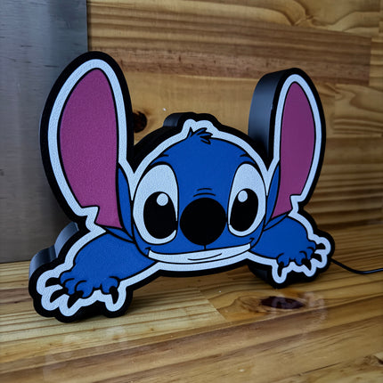 Lampe LED Stitch sur fond noir

