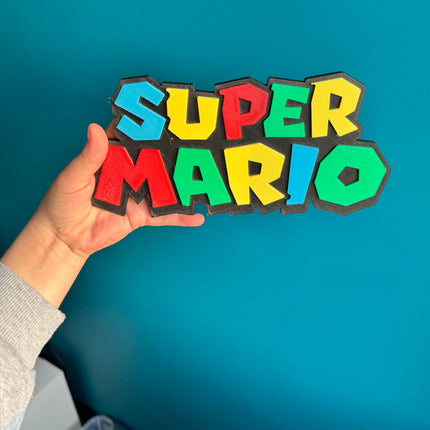 Plaque Super Mario imprimée en 3D, design couleurs vives, 24 cm.

