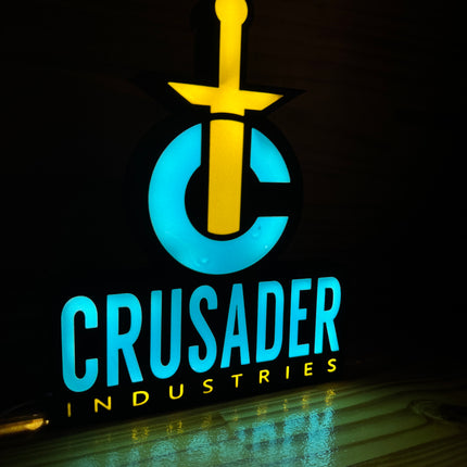 Logo Crusader lumineux bleu or