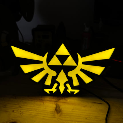 Logo Triforce jaune lumineux
