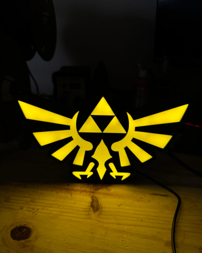Logo Triforce jaune lumineux
