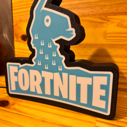 Texte blanc lampe gaming Fortnite
