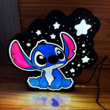 Lampe Stitch bleu rose et fond noir
