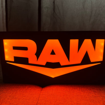 Lampe LED WWE RAW fond noir
