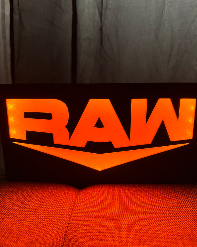 Lampe LED WWE RAW fond noir
