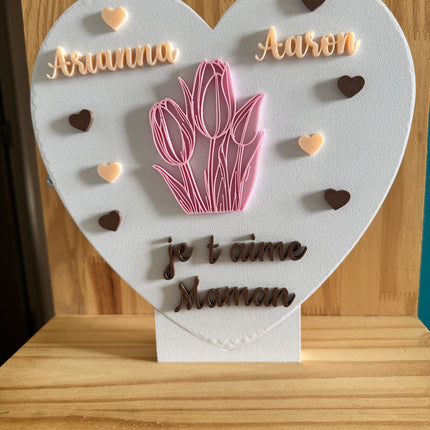Plaque imprimée en 3D, personnalisable avec les prénoms des enfants.

