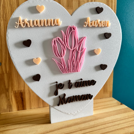 Objet de décoration en forme de cœur, parfait pour maman.

