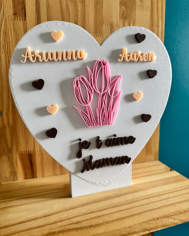 Objet de décoration en forme de cœur, parfait pour maman.


