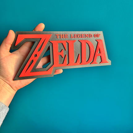 Logo Zelda en rouge et noir, plaque murale geek imprimée en 3D.


